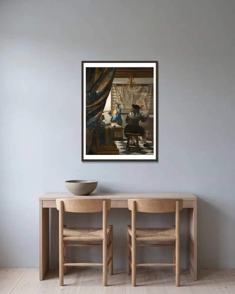 The Art of Painting av Johannes Vermeer inramad på en vägg