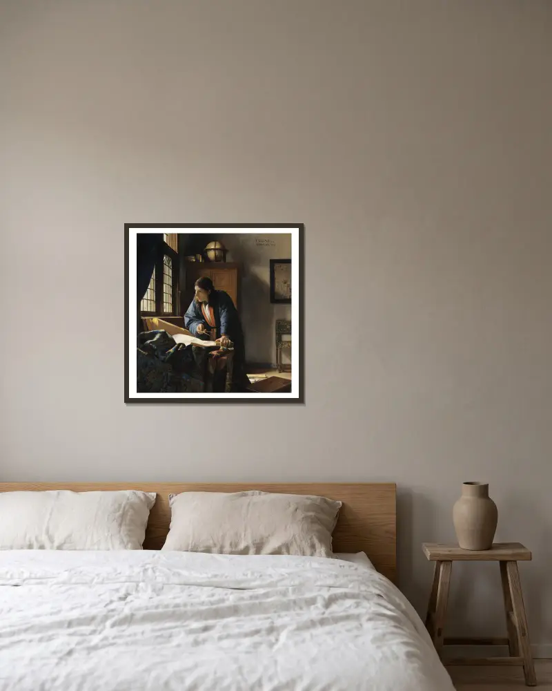 Der Geograph von Johannes Vermeer gerahmt an einer Wand