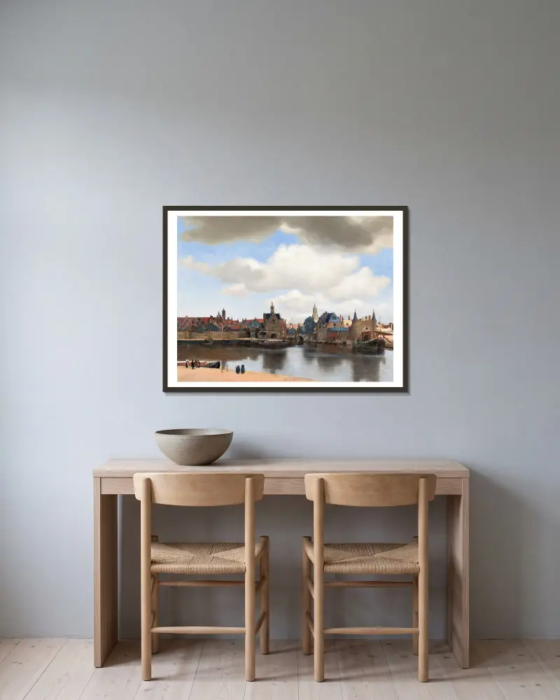 View of Delft av Johannes Vermeer inramad på en vägg