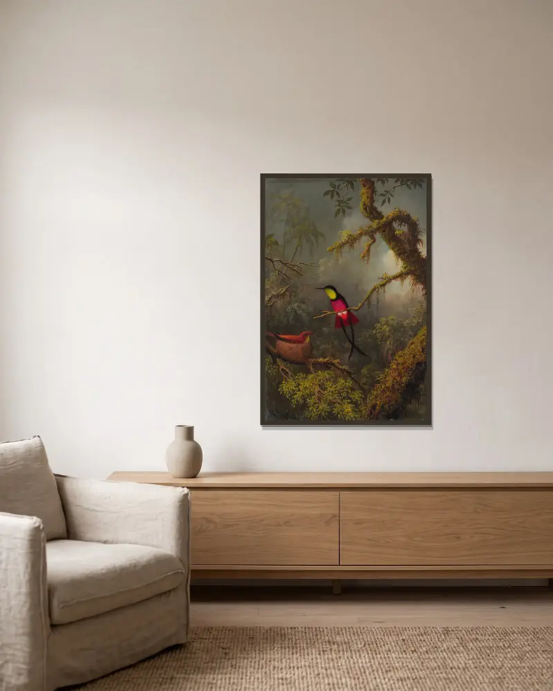 Ett par häckande röda topaskolibrier av Martin Johnson Heade inramad på en vägg