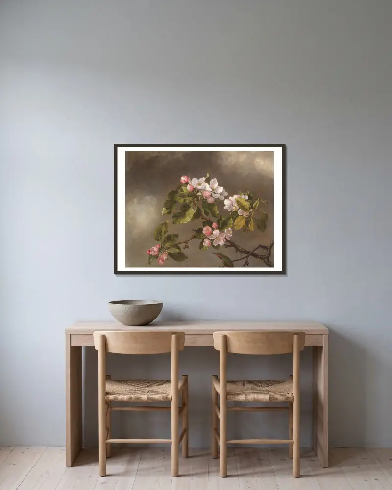 Hummingbird and Apple Blossoms av Martin Johnson Heade inramad på en vägg