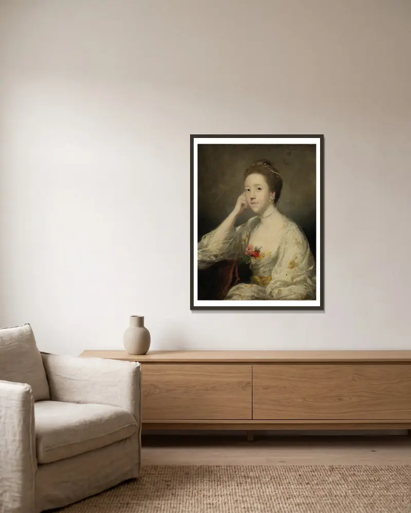 Porträtt av en dam i vitt av Sir Joshua Reynolds inramad på en vägg