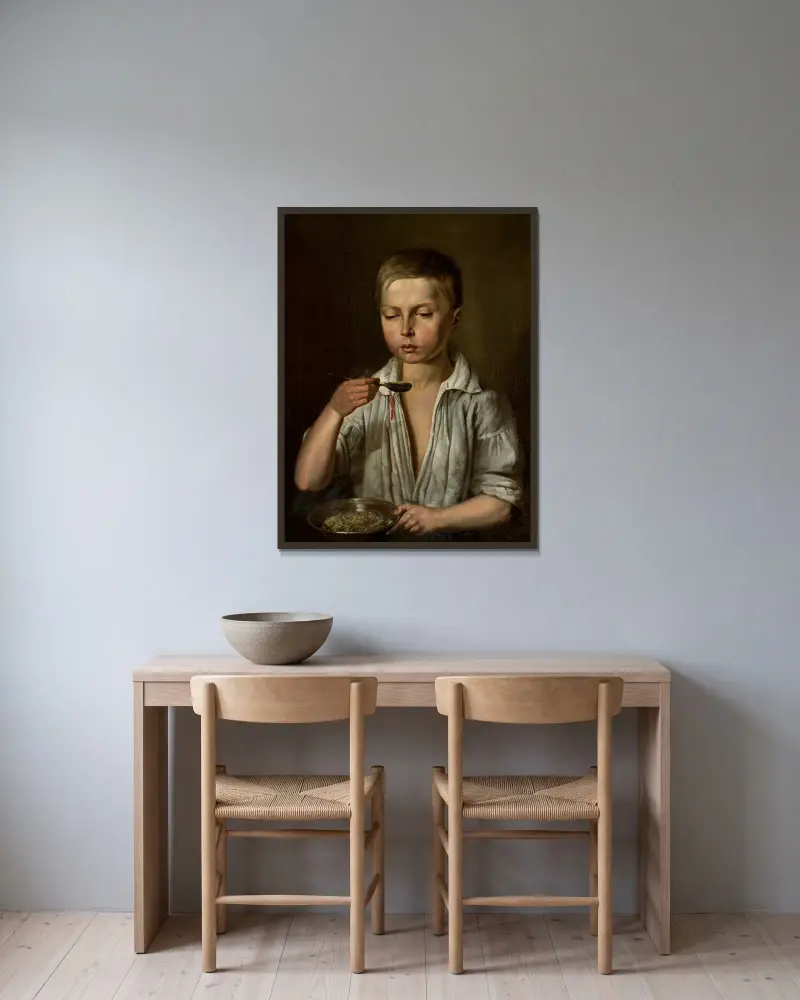 Junge beim Frühstück von Józef Simmler gerahmt an einer Wand