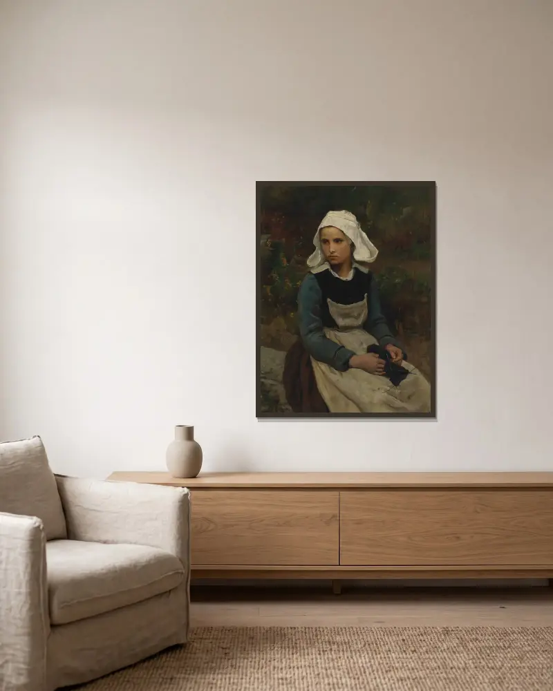 Ung bretonsk flicka som stickar av Jules Breton inramad på en vägg