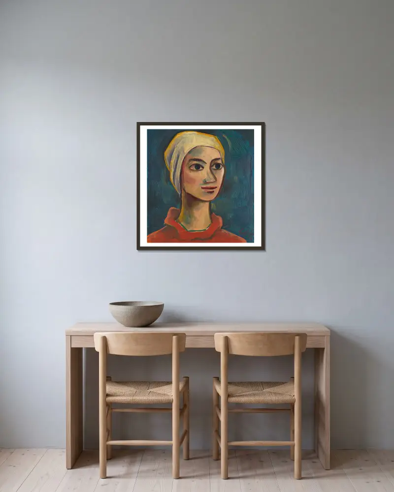 Mädchenporträt von Karl Hofer gerahmt an einer Wand