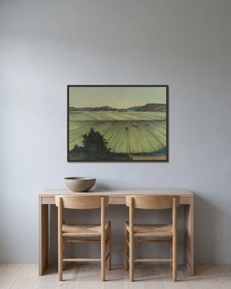 Landskap med fält av Karl Nordström inramad på en vägg