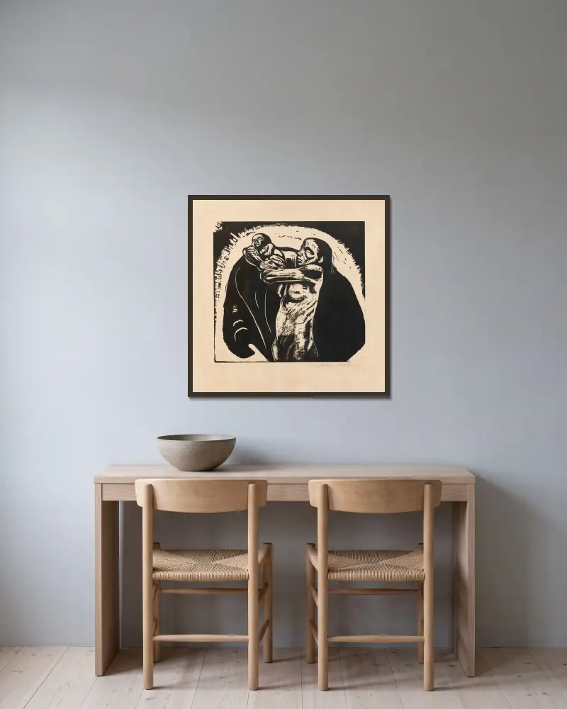Das Opfer av Käthe Kollwitz inramad på en vägg