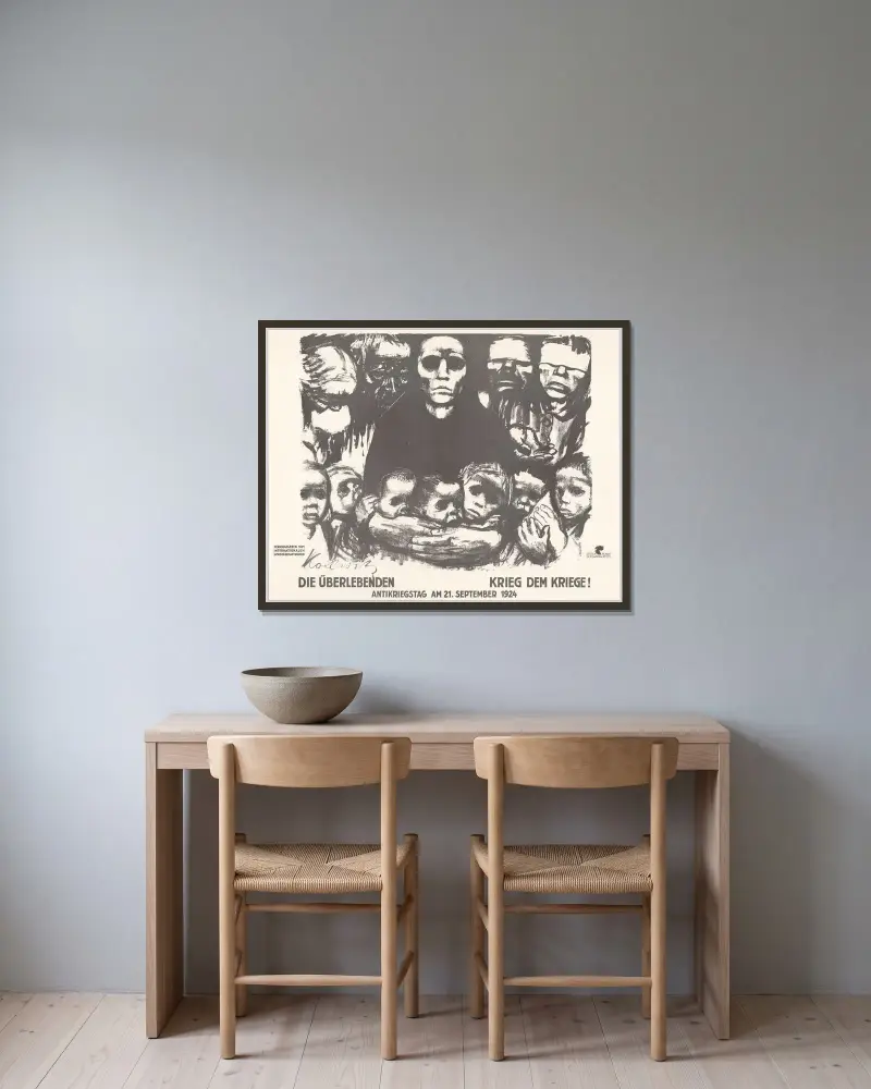 Die Überlebenden av Käthe Kollwitz inramad på en vägg