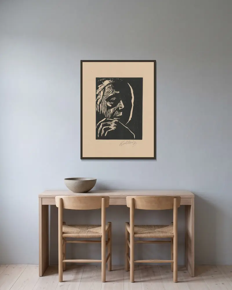 Self-portrait, 1922 av Käthe Kollwitz inramad på en vägg