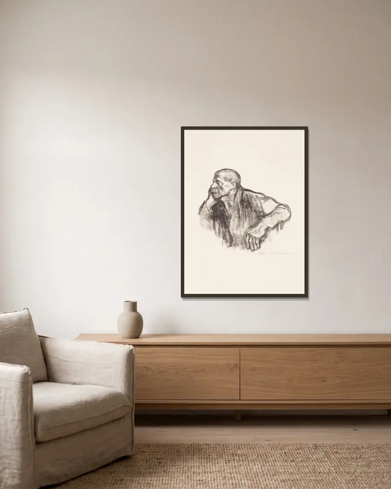 Sitzender Arbeiter av Käthe Kollwitz inramad på en vägg