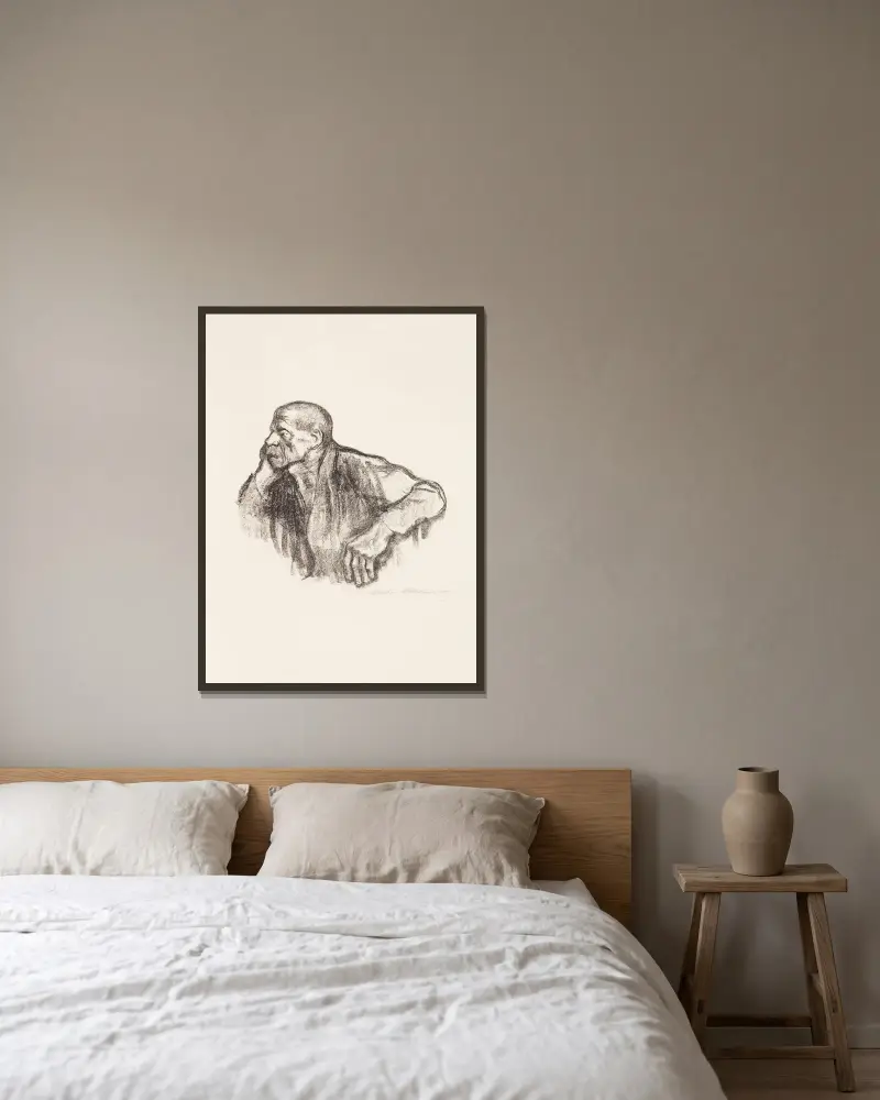 Sitzender Arbeiter av Käthe Kollwitz inramad på en vägg