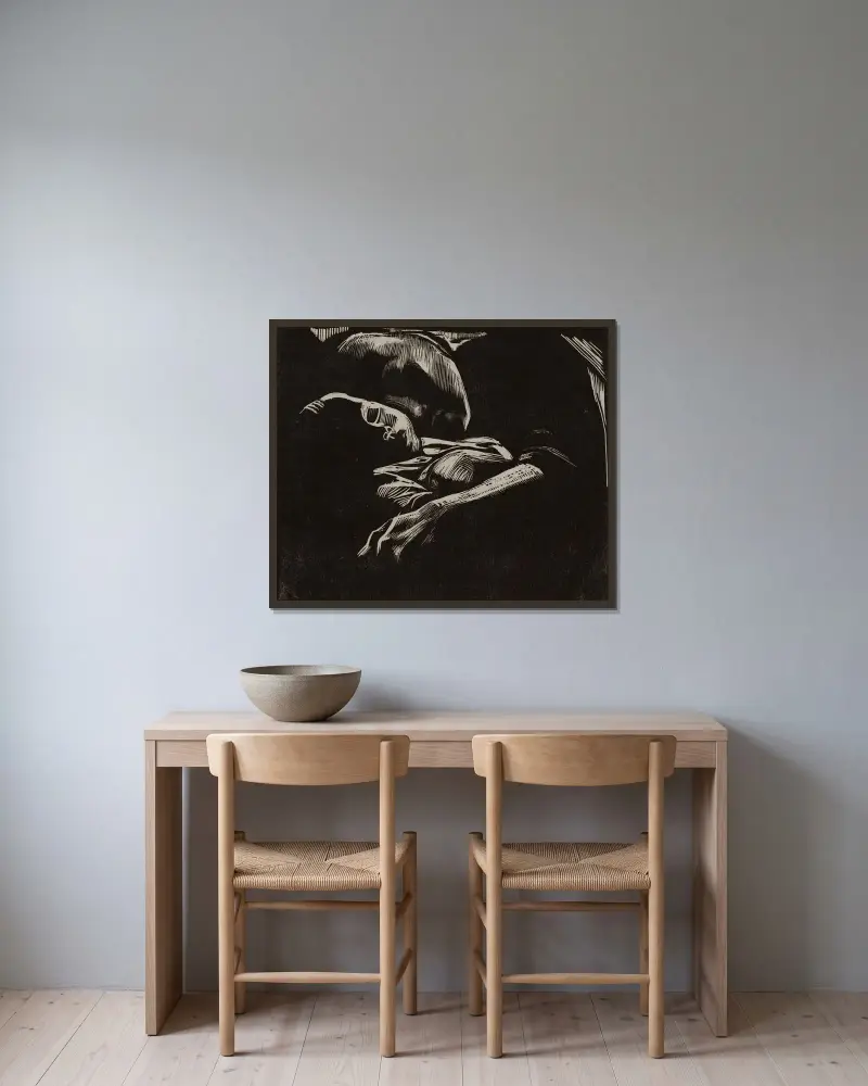 Sovande kvinna med barn av Käthe Kollwitz inramad på en vägg
