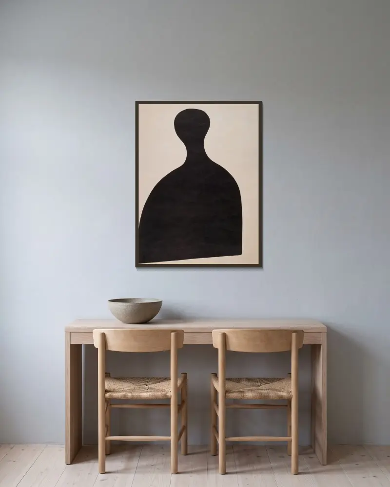 Eierschläger av Kurt Schwitters inramad på en vägg