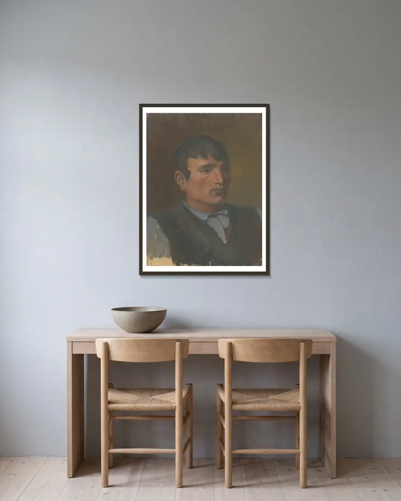 Studie av en ung man i mörk väst av Ladislav Mednyánszky inramad på en vägg