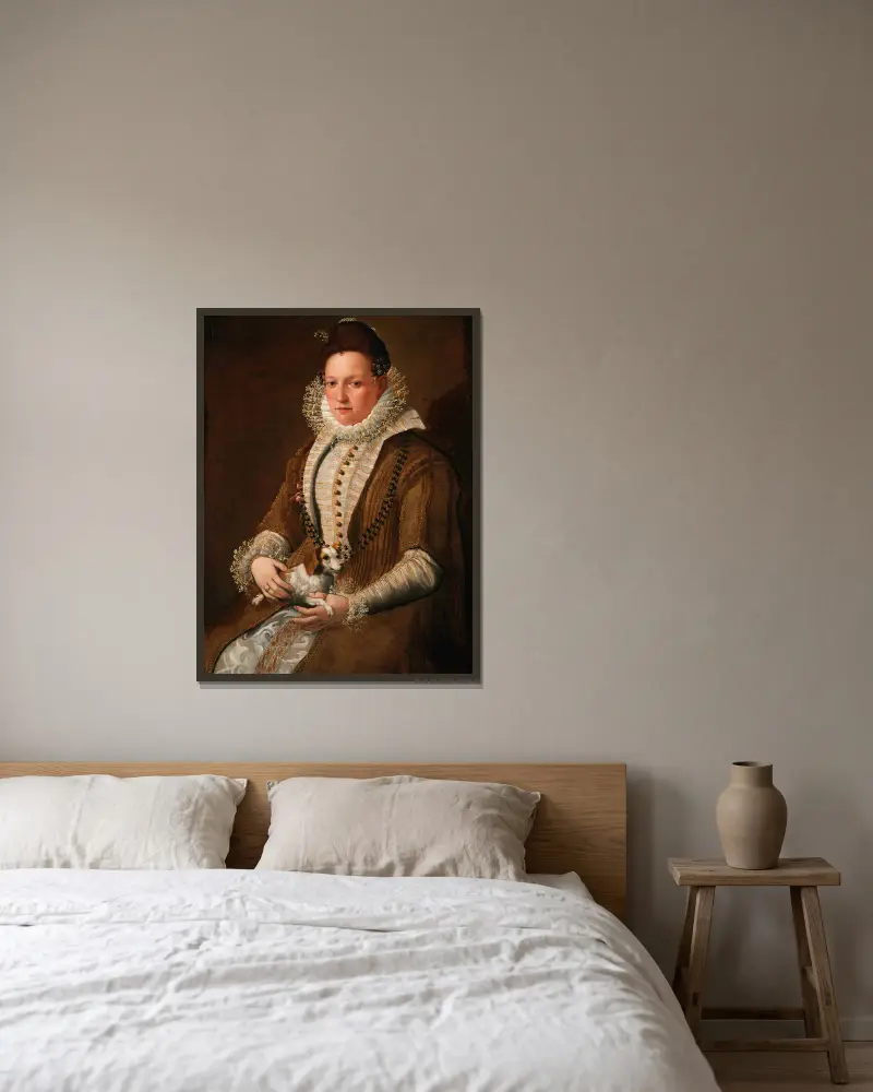 Porträt einer Dame mit Hund von Lavinia Fontana gerahmt an einer Wand