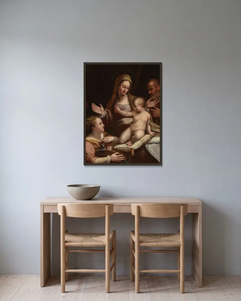 Den heliga familjen med sankta Katarina av Alexandria av Lavinia Fontana inramad på en vägg