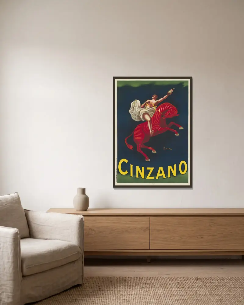 Cinzano av Leonetto Cappiello inramad på en vägg