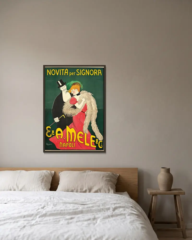 E. And A. Mele And Ci av Leonetto Cappiello inramad på en vägg