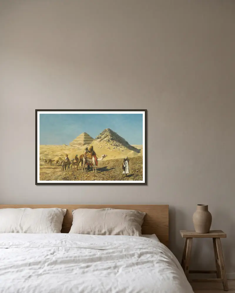 Camel Caravan Amid The Pyramids, Egypt av Edwin Lord Weeks inramad på en vägg
