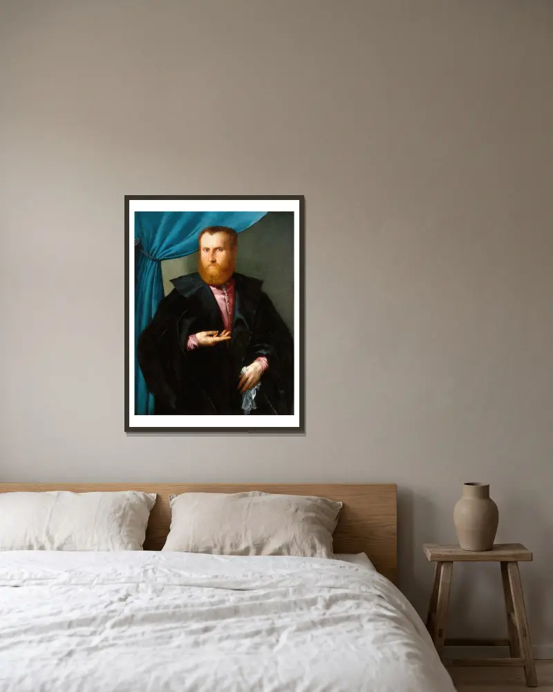 Porträtt av en skäggig man av Lorenzo Lotto inramad på en vägg