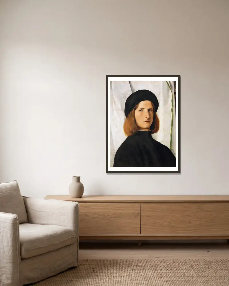 Porträtt av ung man med lampa av Lorenzo Lotto inramad på en vägg