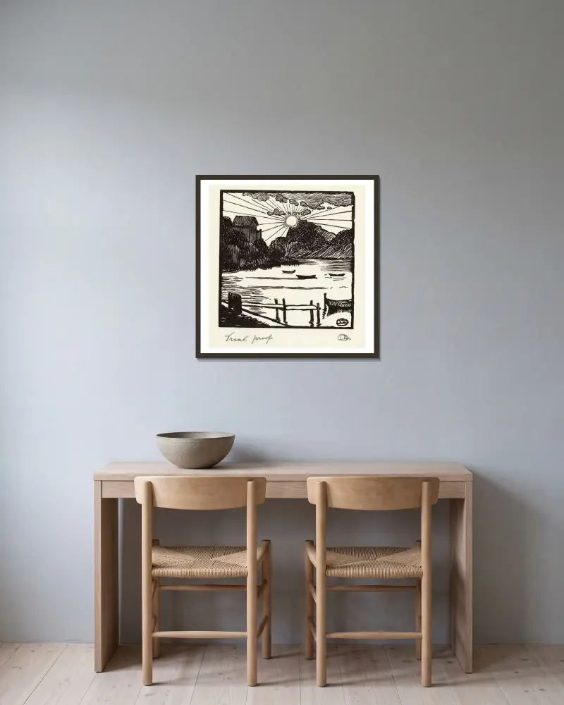Soluppgång över en sjö av Lucien Pissarro inramad på en vägg