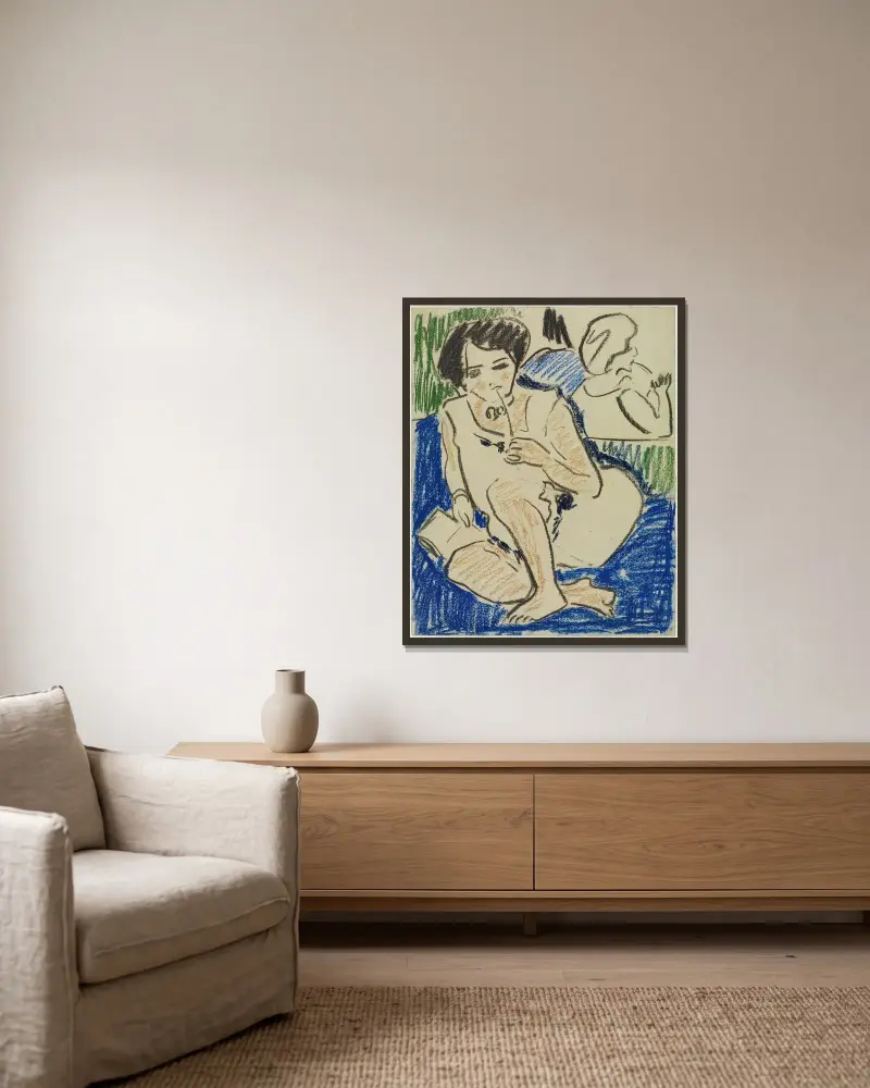Hockende mit Buch von Ernst Ludwig Kirchner gerahmt an einer Wand