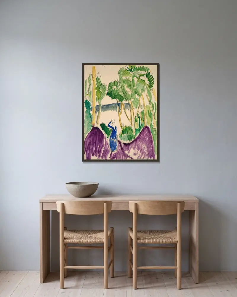 Frau in den Dünen auf Fehmarn von Ernst Ludwig Kirchner gerahmt an einer Wand