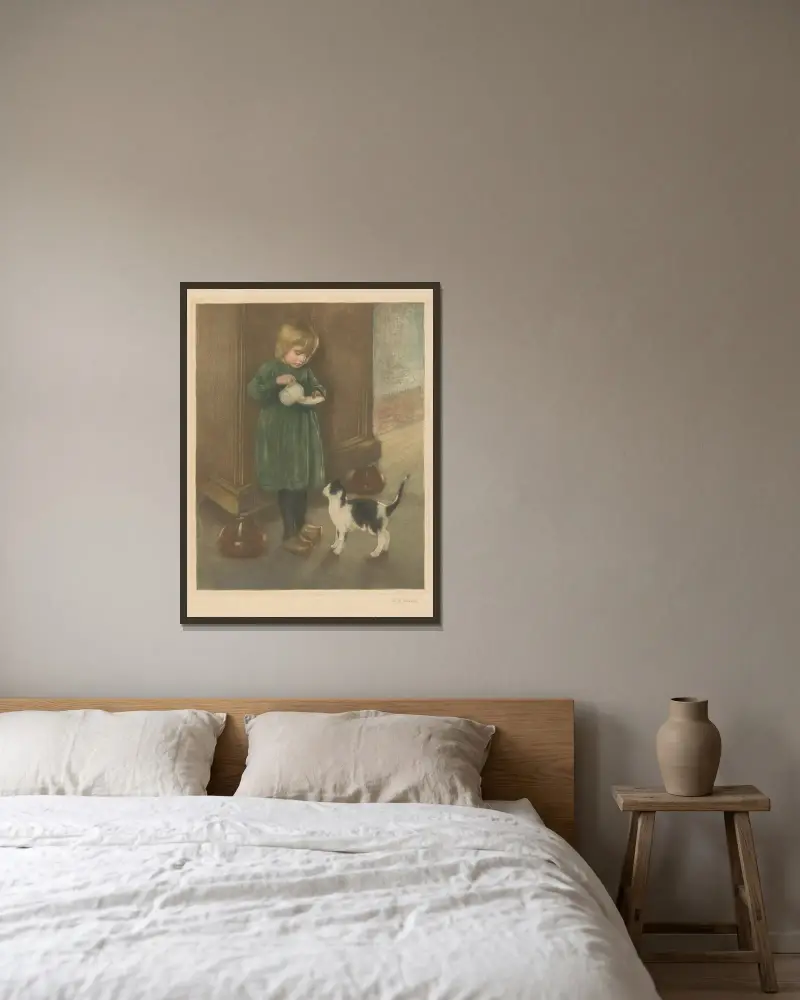 Girl feeding a cat av Hendrik Maarten Krabbé inramad på en vägg