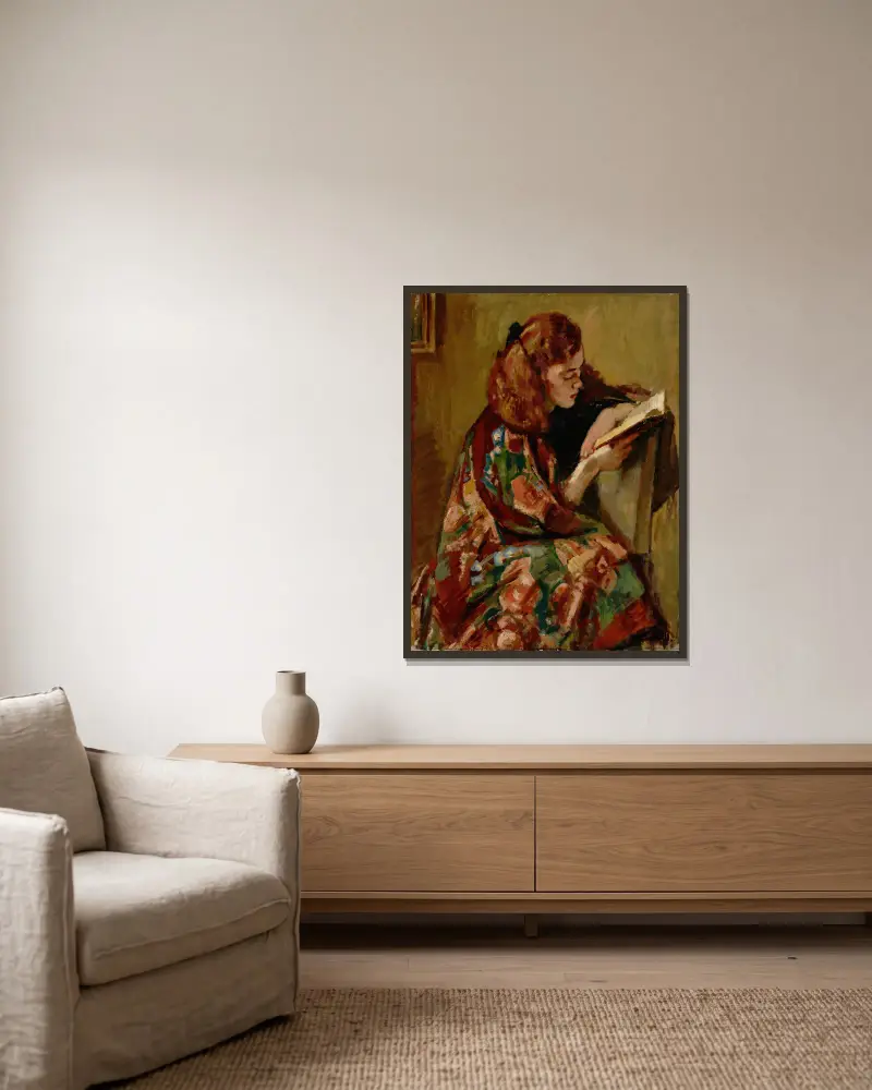 Lesendes Mädchen von Magnus Enckell gerahmt an einer Wand