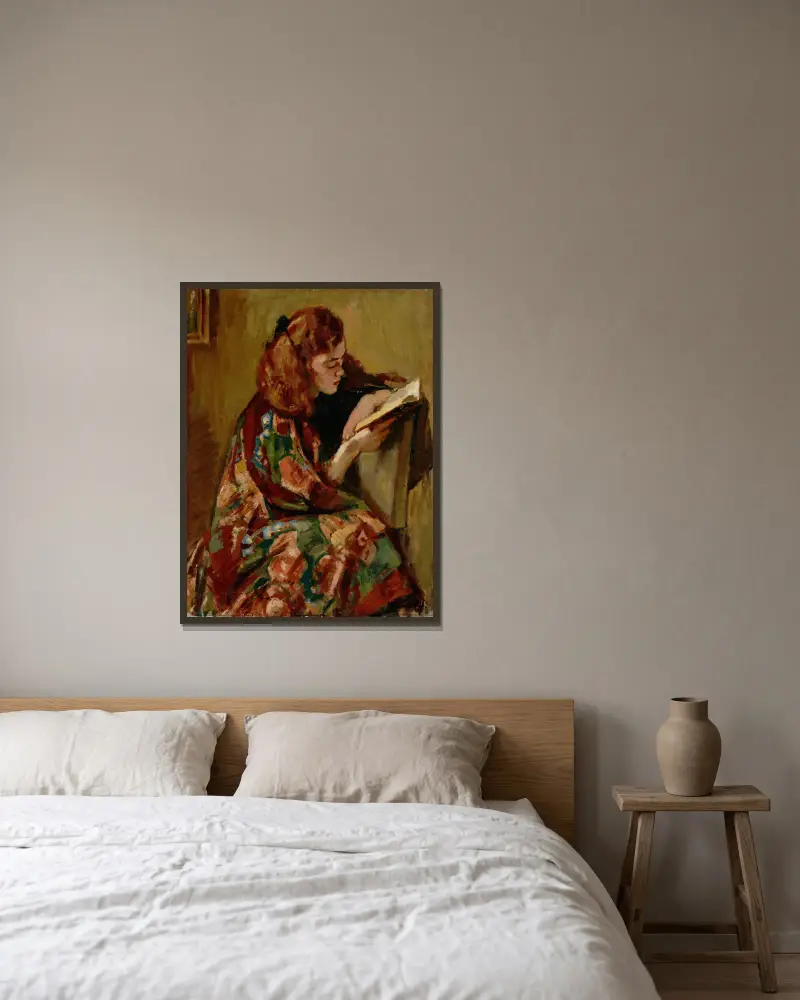 Lesendes Mädchen von Magnus Enckell gerahmt an einer Wand