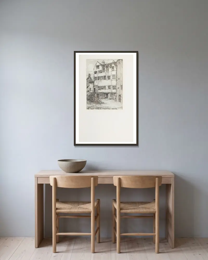 Das alte Fachwerkhaus von Jessie Marion King gerahmt an einer Wand