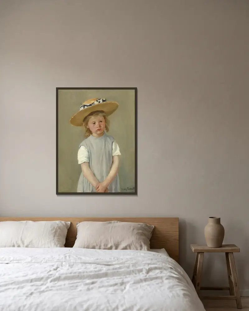 Kind mit Strohhut von Mary Cassatt gerahmt an einer Wand