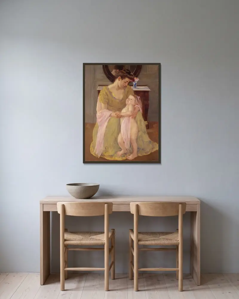 Mor och barn med rosenscarf av Mary Cassatt inramad på en vägg