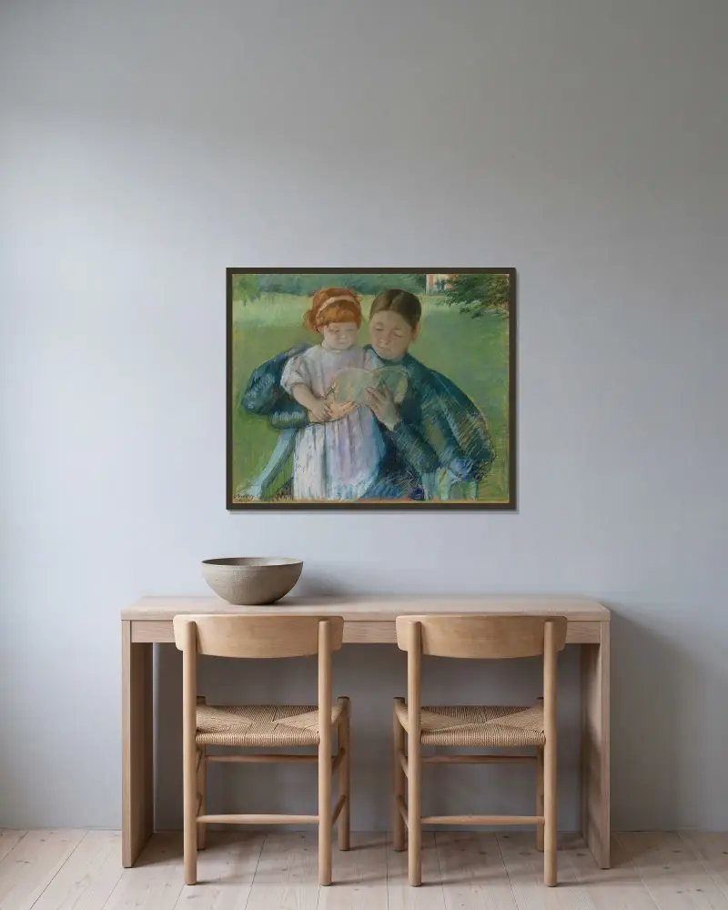 Sköterska läser för en liten flicka av Mary Cassatt inramad på en vägg