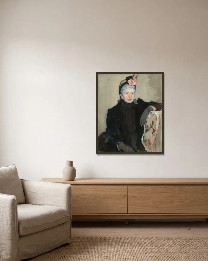 Porträtt av en äldre dam av Mary Cassatt inramad på en vägg