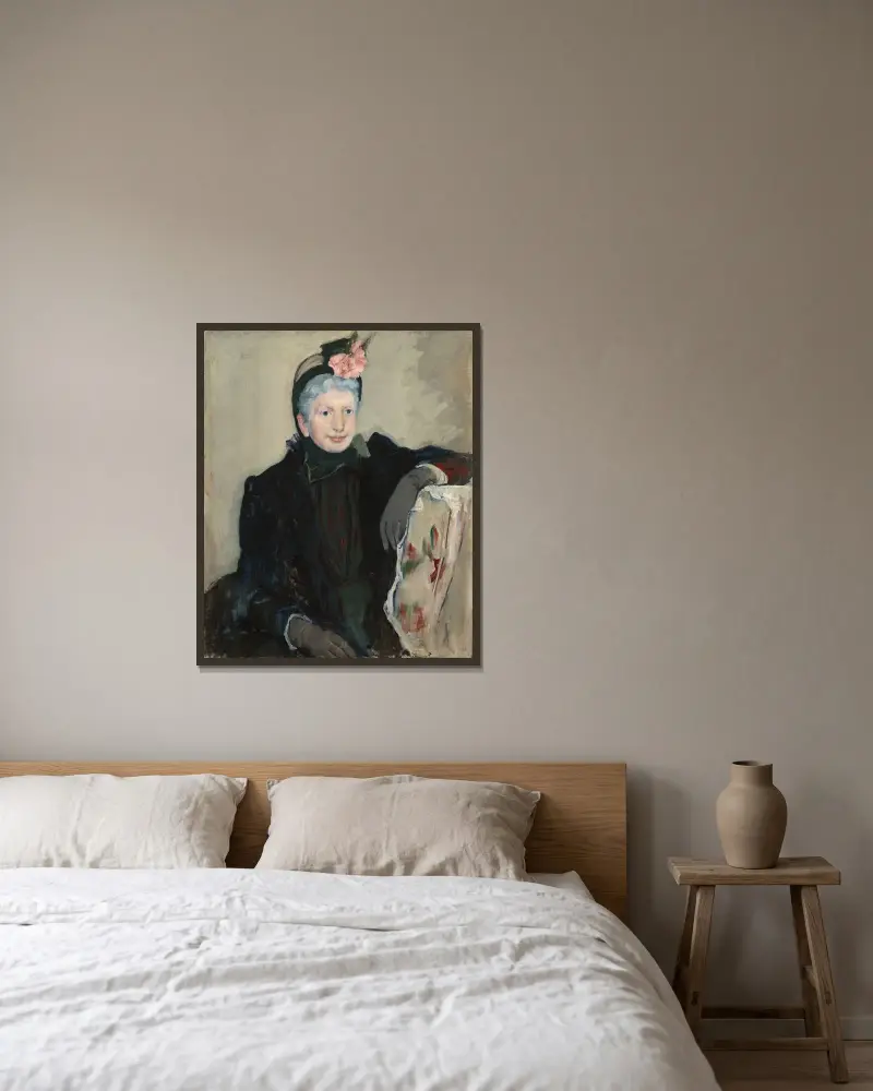 Porträtt av en äldre dam av Mary Cassatt inramad på en vägg