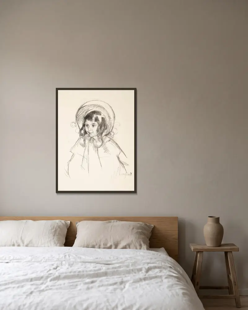 Sara med bahytt och kappa av Mary Cassatt inramad på en vägg