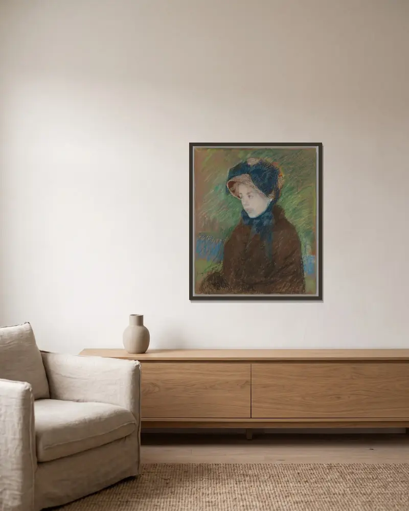 Susan i halmhatt av Mary Cassatt inramad på en vägg