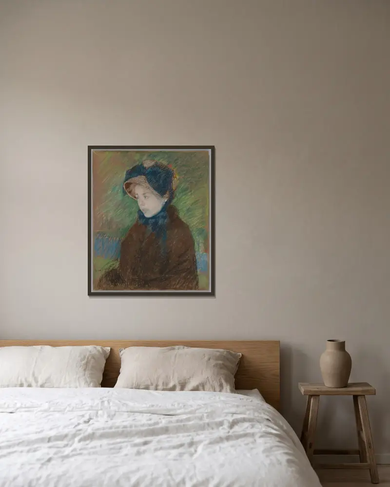 Susan i halmhatt av Mary Cassatt inramad på en vägg
