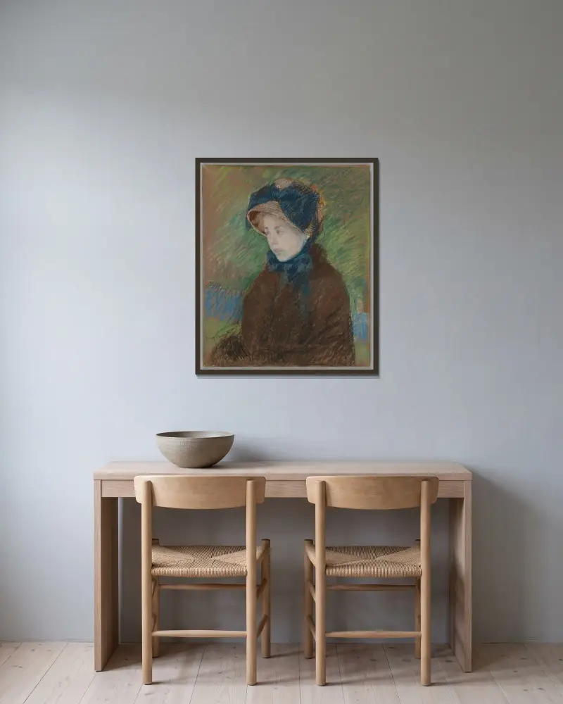 Susan i halmhatt av Mary Cassatt inramad på en vägg