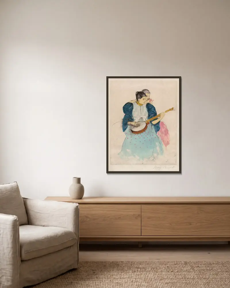The Banjo Lesson av Mary Cassatt inramad på en vägg