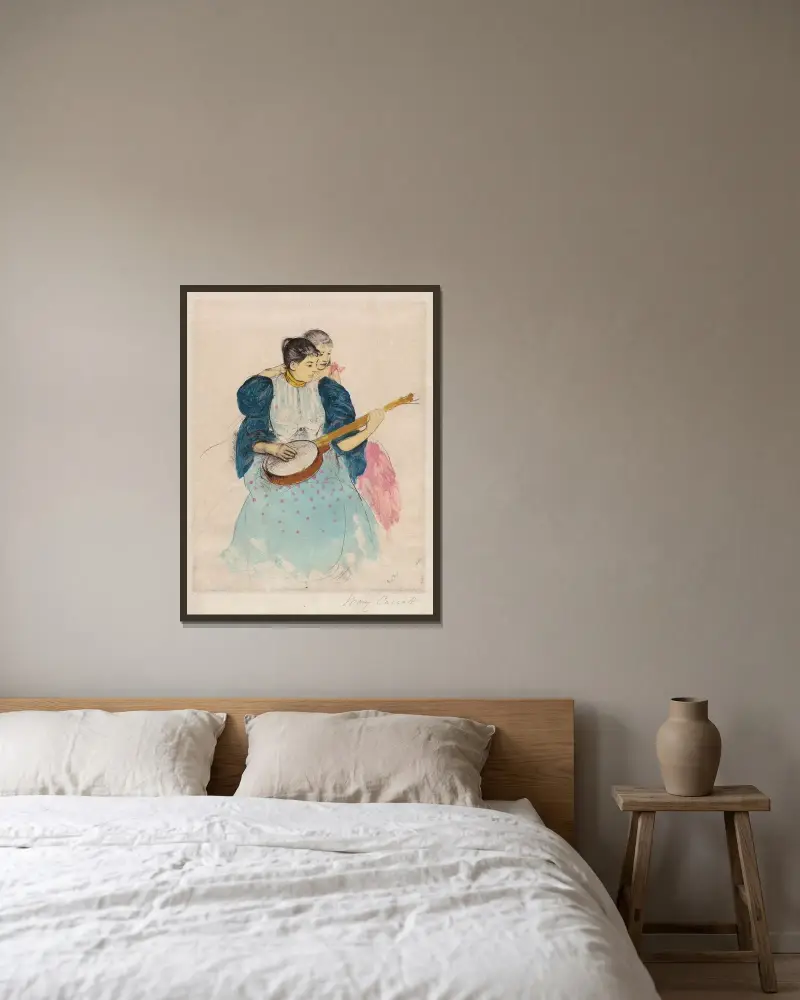 The Banjo Lesson av Mary Cassatt inramad på en vägg