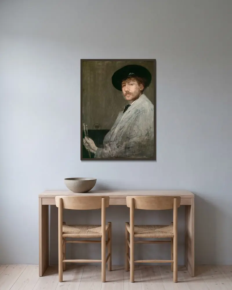 Arrangemang i grått, porträtt av konstnären av James Abbott McNeill Whistler inramad på en vägg