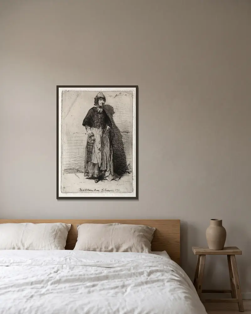 La Mère Gérard av James Abbott McNeill Whistler inramad på en vägg