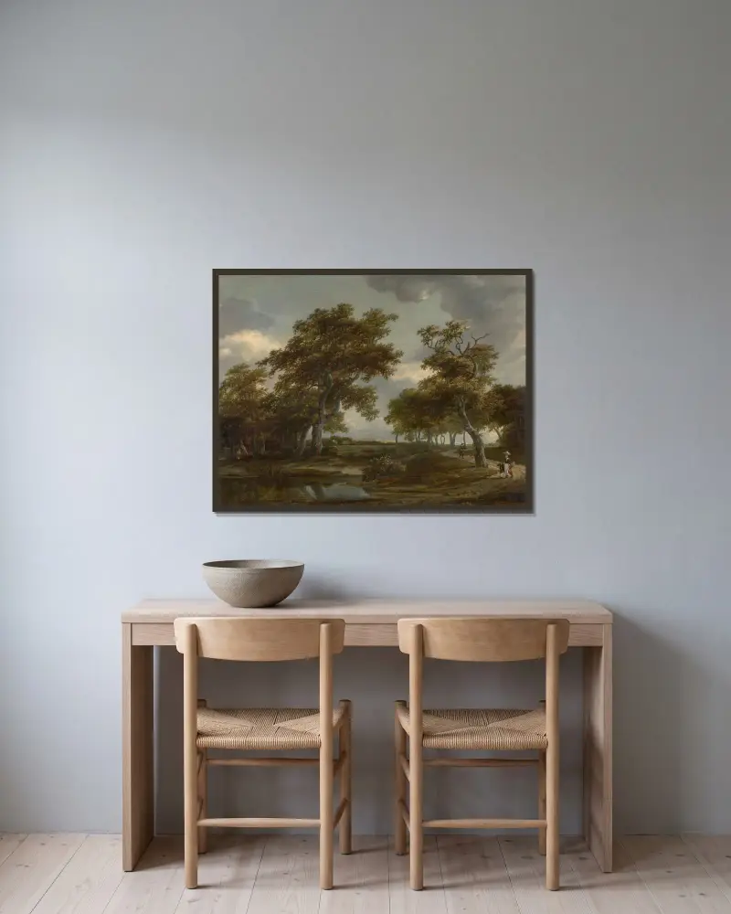 Bewaldete Flusslandschaft mit Figuren auf einem Weg von Meindert Hobbema gerahmt an einer Wand