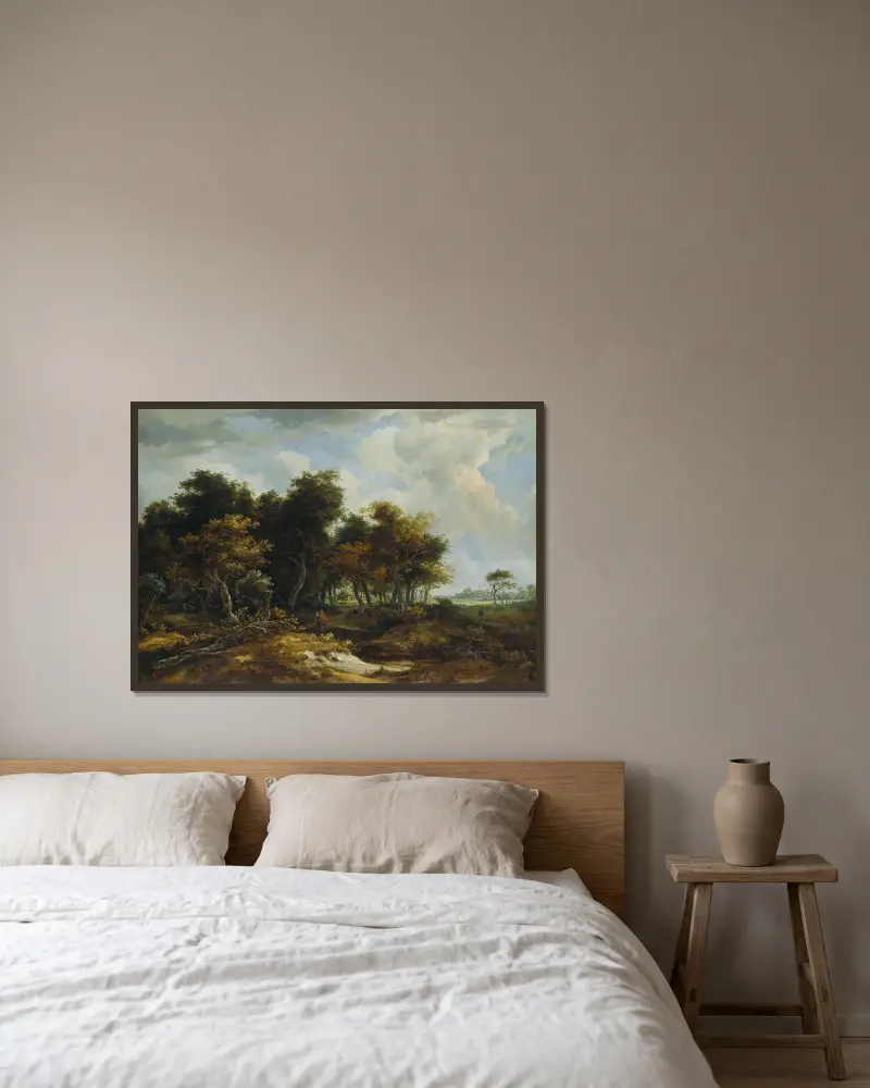 Ingång till en skog av Meindert Hobbema inramad på en vägg