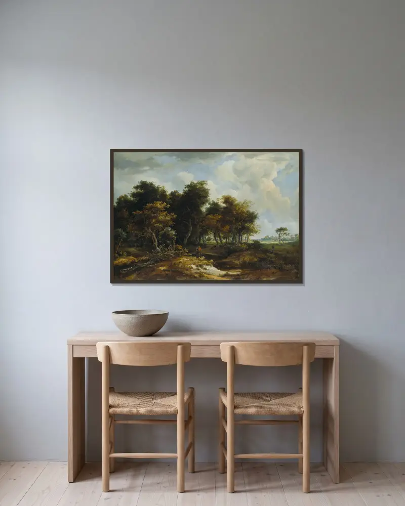 Ingång till en skog av Meindert Hobbema inramad på en vägg