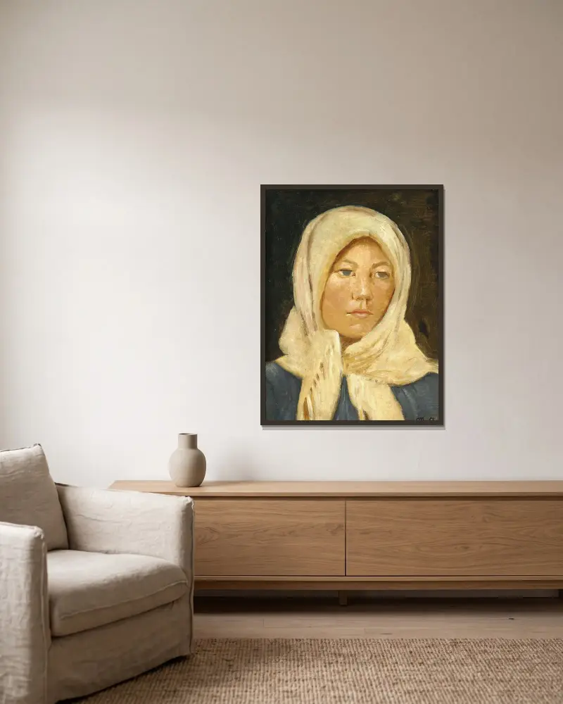 Ung skagenflicka med halsduk av Michael Ancher inramad på en vägg