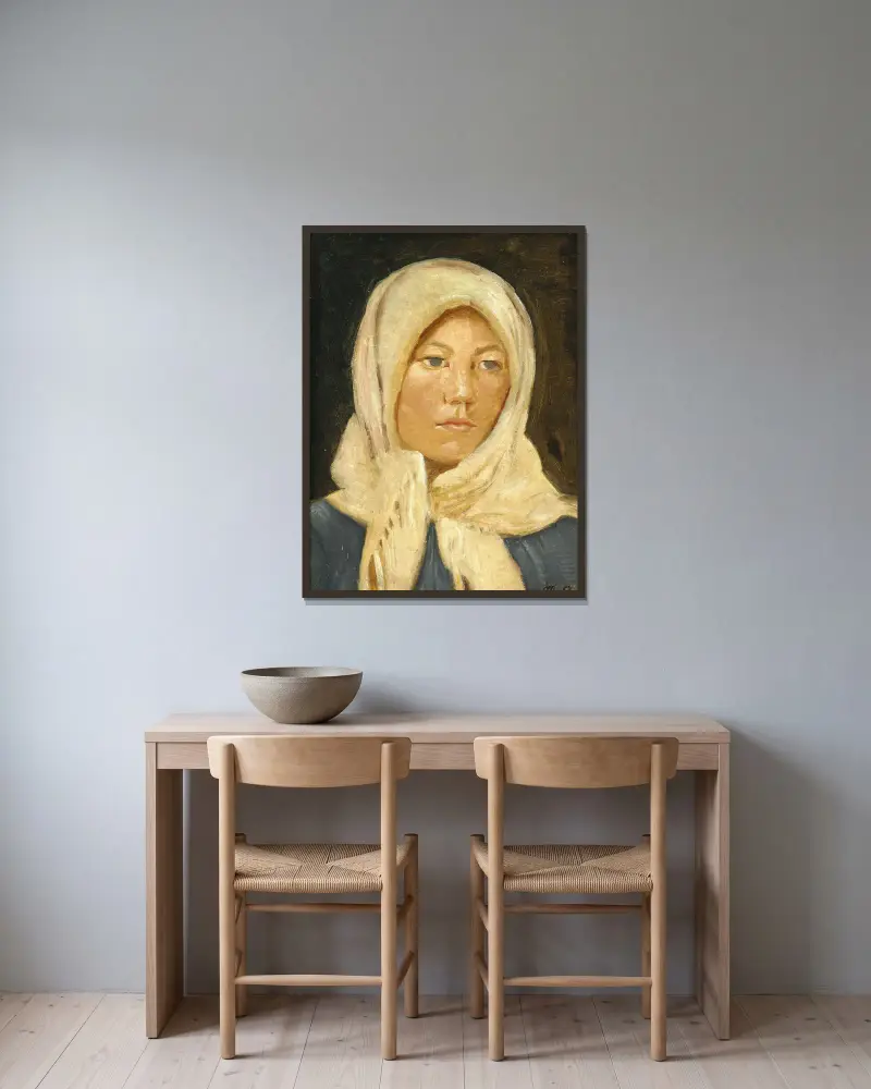 Ung skagenflicka med halsduk av Michael Ancher inramad på en vägg
